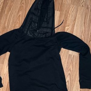 Black hoodie with zippered sides and cute Greek design on hood